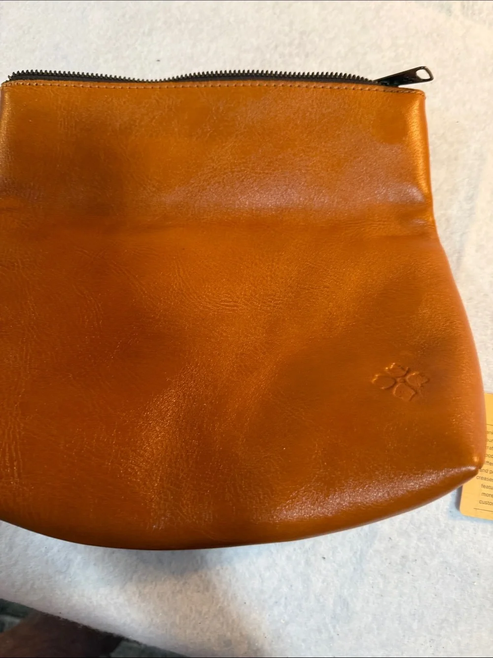 Patricia Nash Tooled Floral Leather Wristlet in Cognac Brown